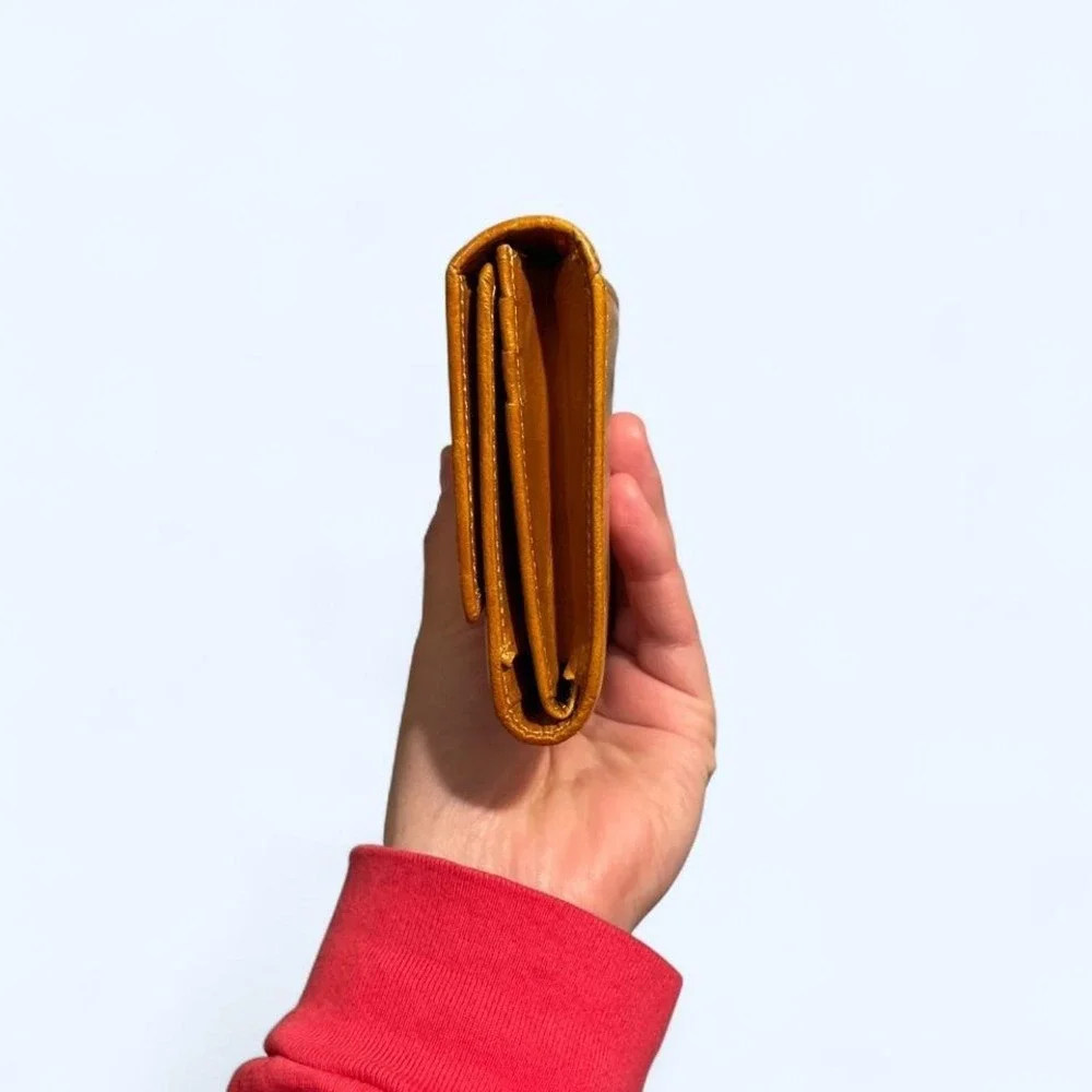 Tan‎ leather wallet with a classic look